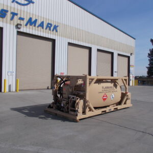 Industrial storage facility with multiple bay doors and a large beige fuel tanker labeled Flammable in the foreground.